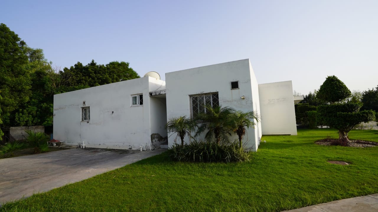 12 kanal farm house 🏡 available for sale 300 ft. Front Bedian Road in Thethar......Top Notch Location..........